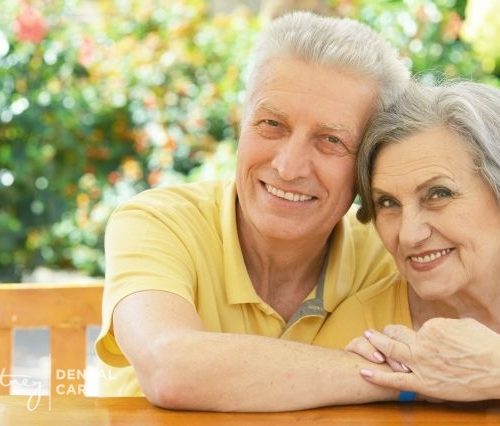 Beautiful Couple Smiling with Their Dentures