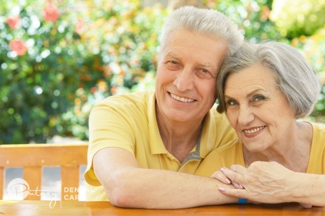 Beautiful Couple Smiling with Their Dentures