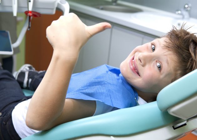 dentist - happy young boy dental check up with putney dental care Teeth Whitening Macquarie Park